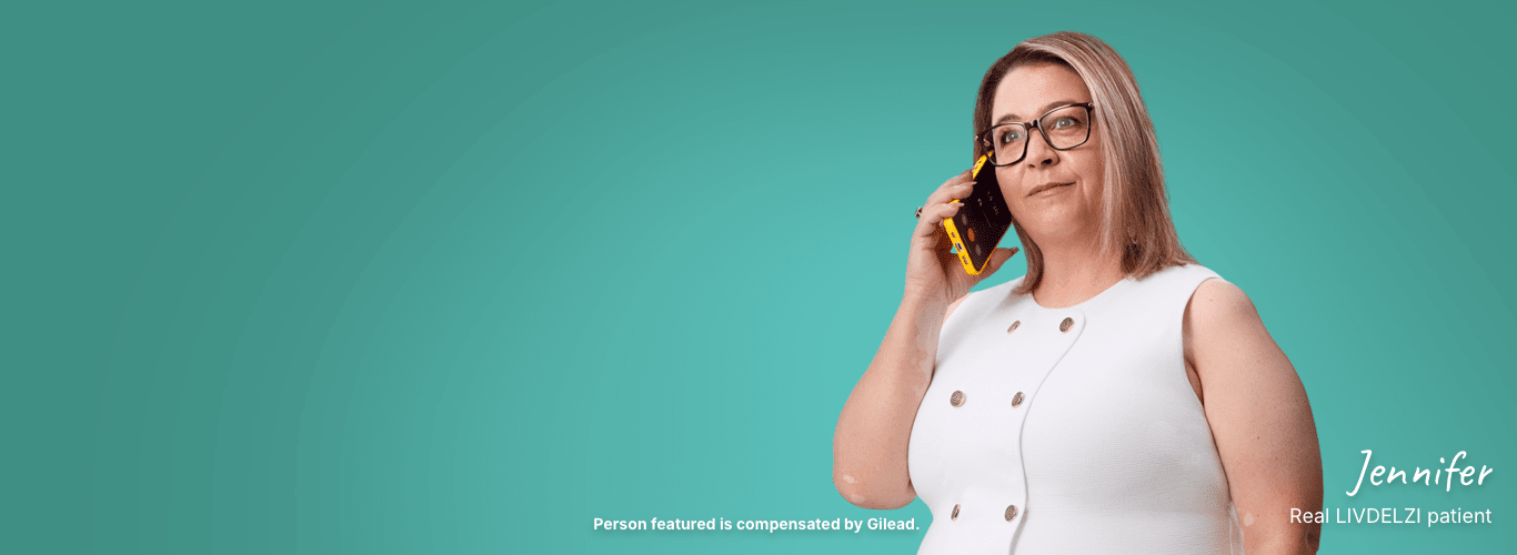 Jennifer, a woman with PBC, on the phone with a teal background 