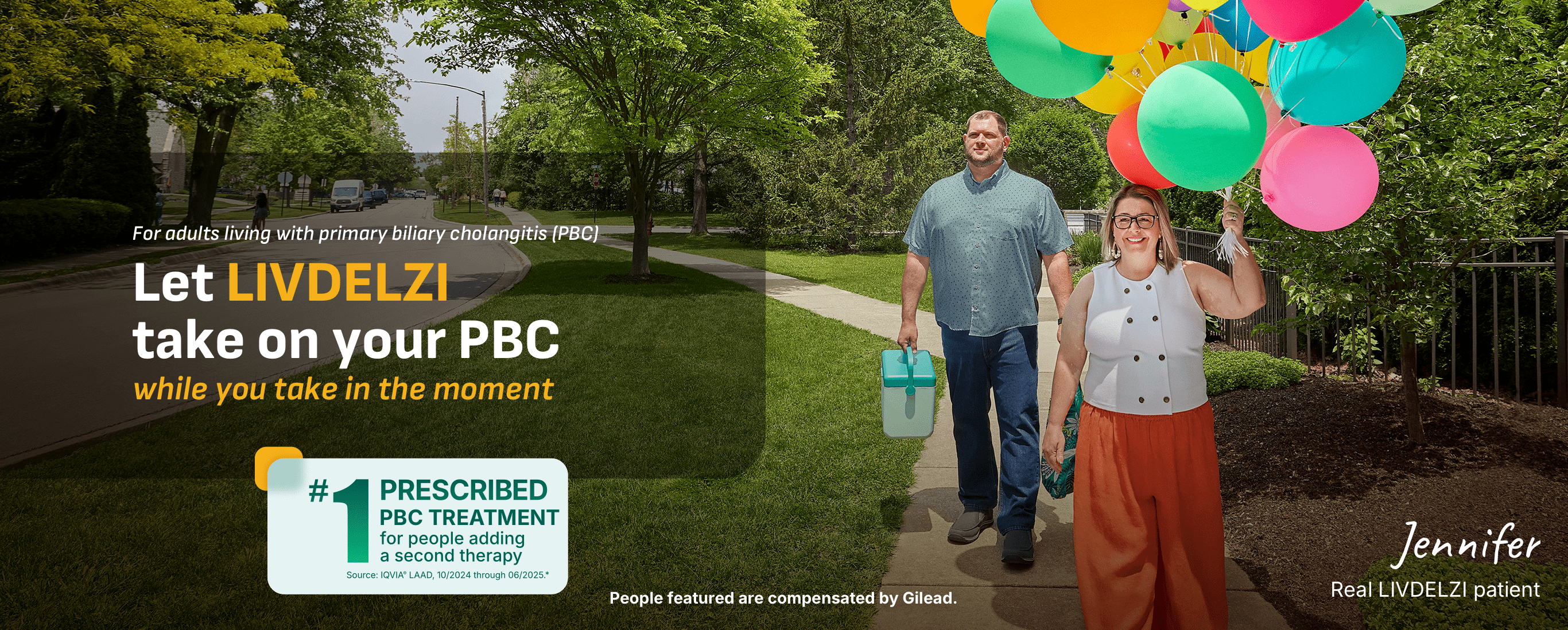 Jennifer, a woman with PBC, holding balloons while walking with her husband, who is holding a cooler, in a park