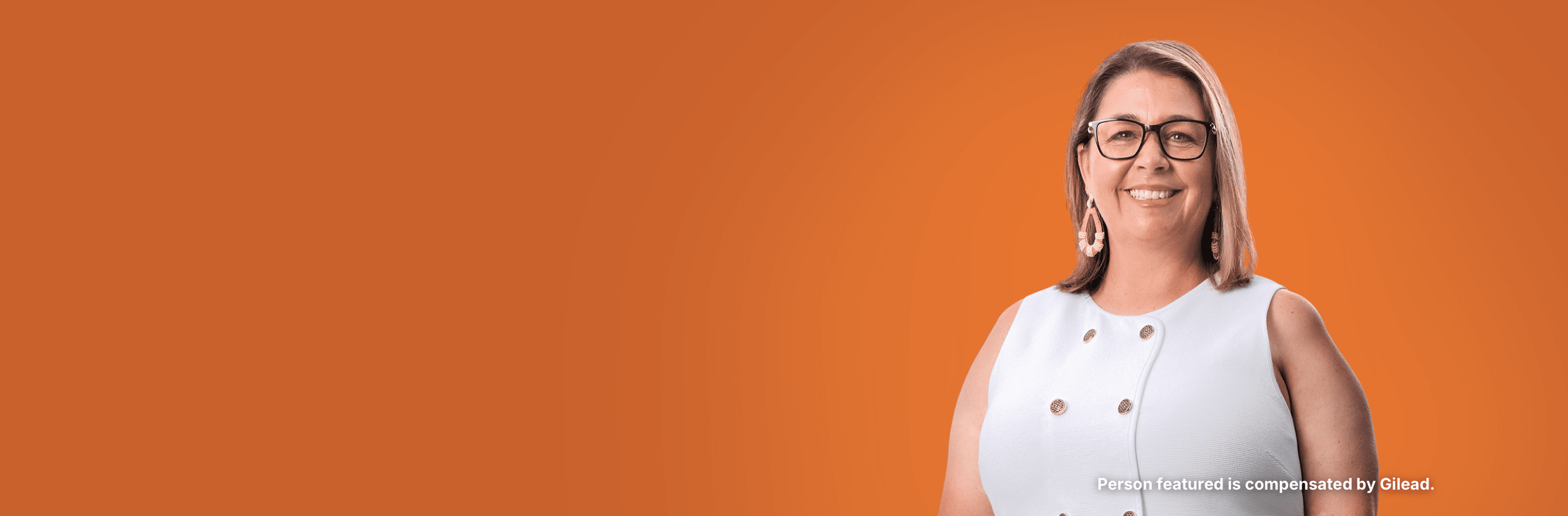 Jennifer, a woman with PBC, standing in front of an orange background