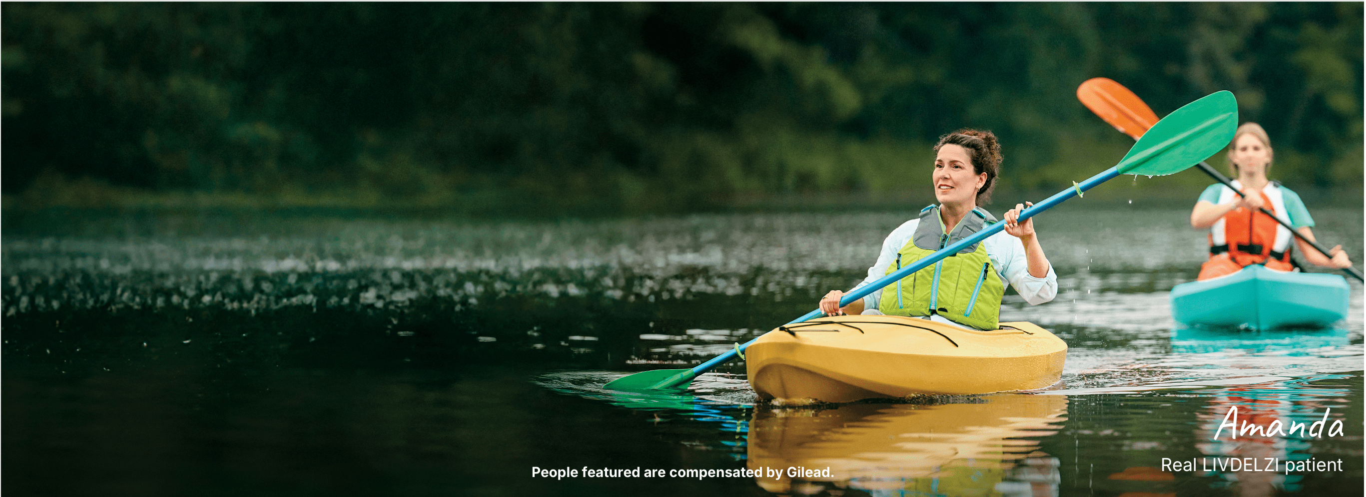 Amanda, a woman with PBC, smiling while kayaking with her husband in a pond