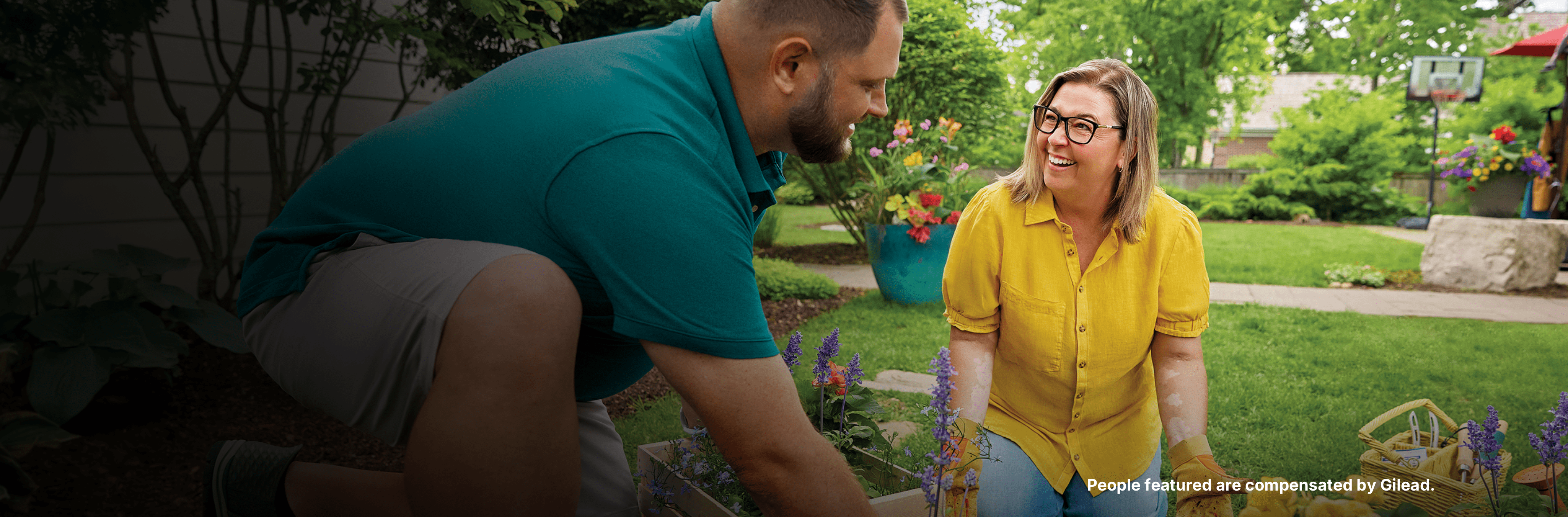 Jennifer, a woman with PBC, gardening in a yard with her husband