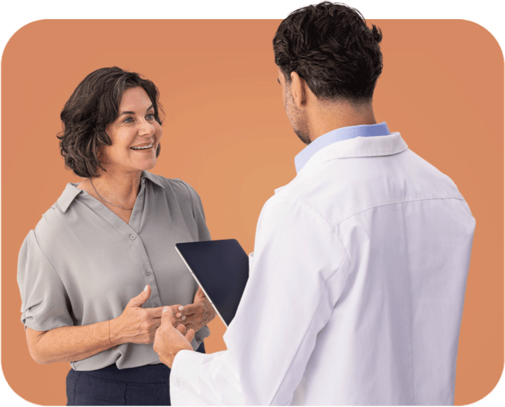 Patient having a discussion with their healthcare provider. Actor portrayals.
