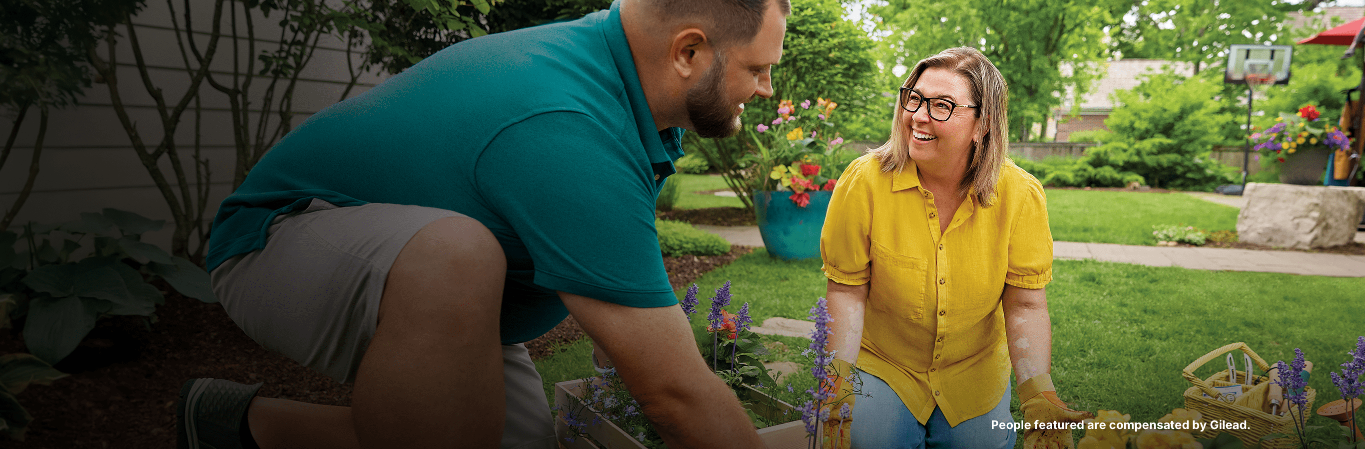 Two people next to a kayak. Actor portrayals.