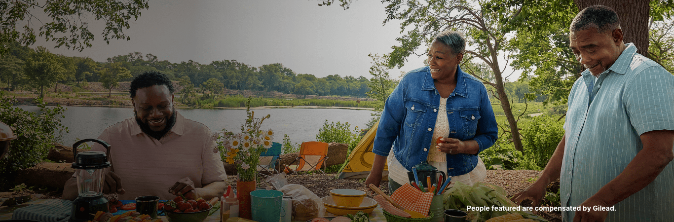 Angela, a woman with PBC, having a picnic with her family