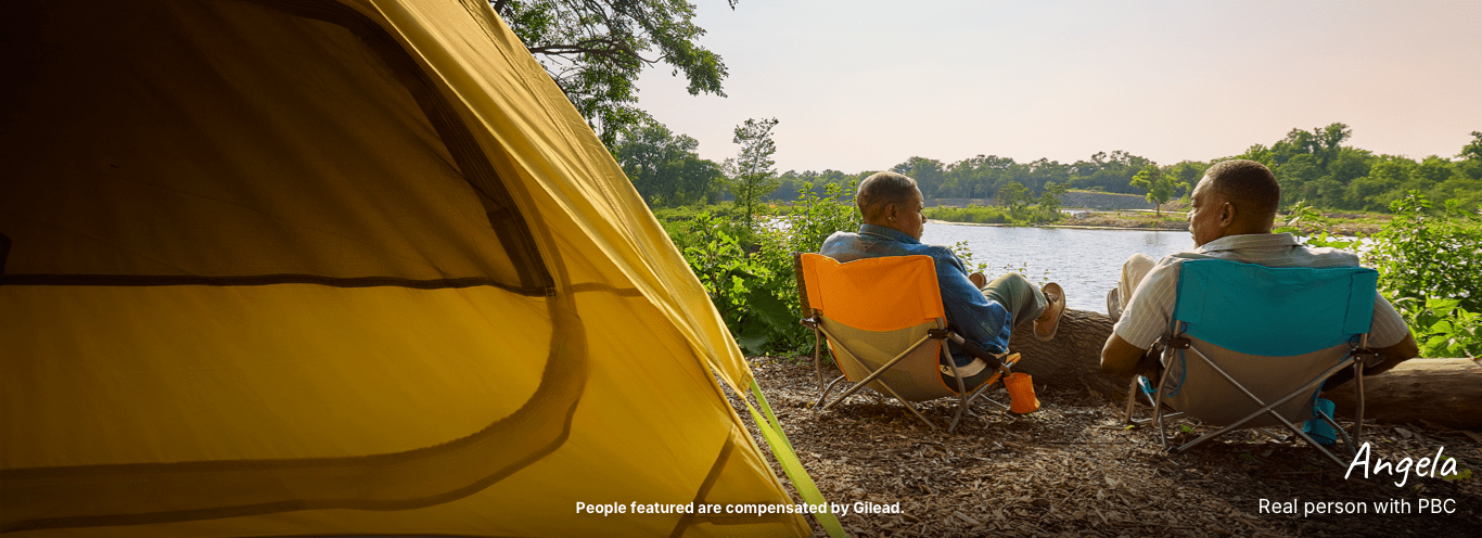 Angela, a woman with PBC, camping with her husband