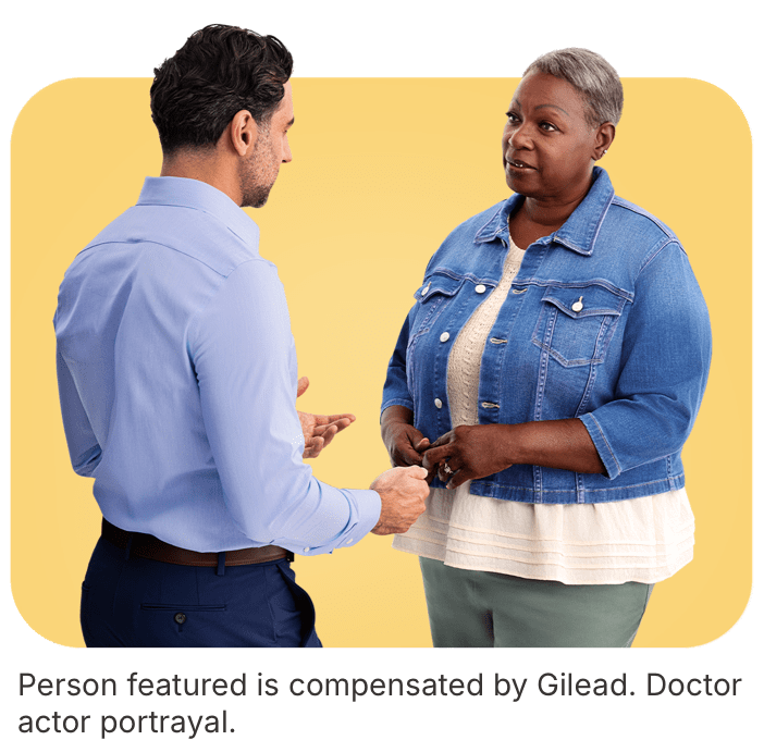 Patient having a discussion with their healthcare provider. Actor portrayals.
